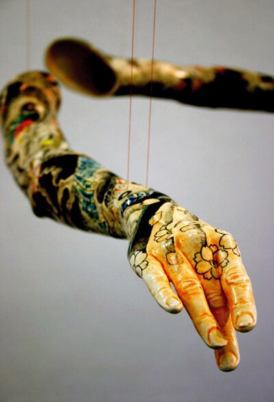 Min Jeong Seo, Tattoo, 2006(Porcelain molded from the arms of professional ballet dancers and painted with Japanese Yakuza-style tattoo patterns)