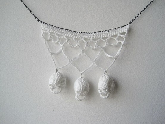 teeny little crocheted skull necklace