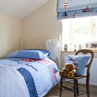 Tranditional boy's bedroom with a nautical twist