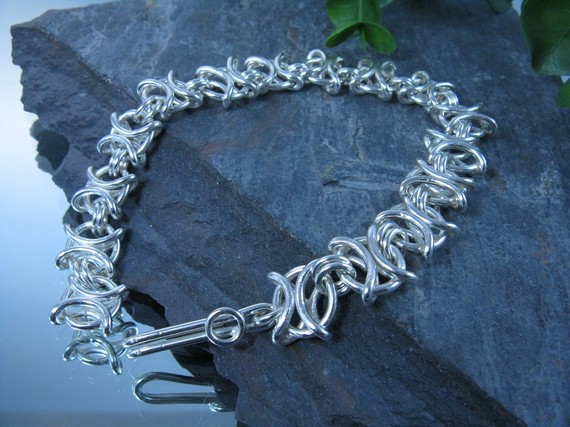 Sterling Silver Bracelet X's and O's by Metalmorphis on Etsy