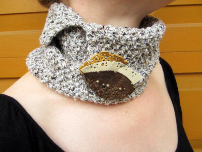 Neck warmer cowl with leather brooch