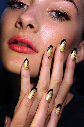 Contrasting a gold chrome nail with black edging, or doing a peachy nude nail with a slim silver perimeter. Picking up some gold leafing at your local craft store, applying it to wet polish with some tweezers, and sealing your million dollar mani with a top coat to protect it.