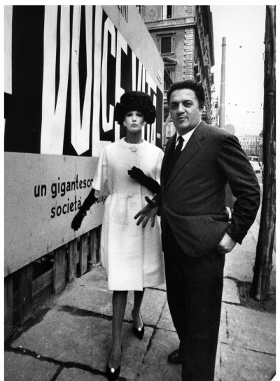 Simone (wearing Simonetta) with director Federico Fellini, photo by William Klein, Rome, 1960