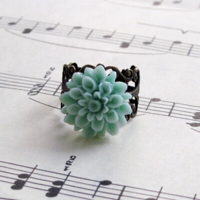 http://www.etsy.com/listing/59877979/ring-jewelry-flower-dahlia-flower-mum?ref=fp_treasury_7