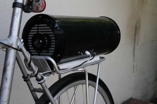 How it all started: I ride my bike in a community ride every week, and the folks there wanted some way to enjoy music on the ride. I tried a regular boom box, but it's just not made for bike mounting. Being an engineer, I decided to make my own bike-mounted sound system. This is what I came up with.