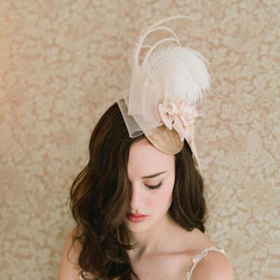 Plumed, peachy blush mini hat