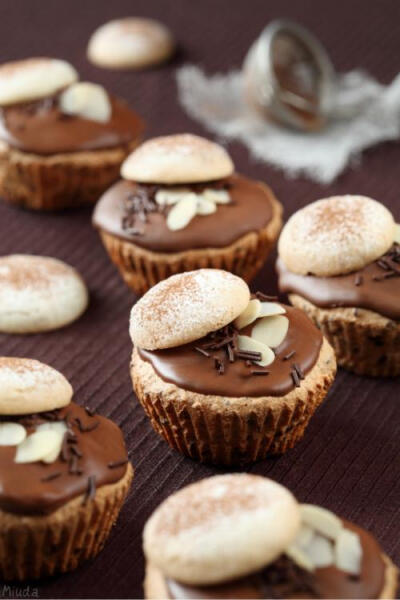 chocolate chip almond muffins with ganache and macarons.