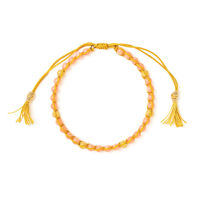 pink coral healing gem bracelet with gold dipped stardust beads and tassel