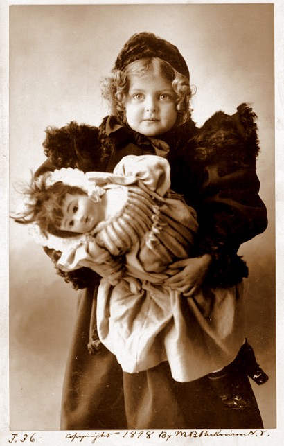 1898.. child and her doll