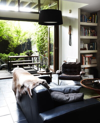 ultimate living room: outdoor space, book shelves, comfortable and modern