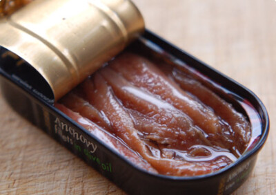 Tin of anchovies silver slender salty little fish