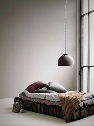 bed and hanging light