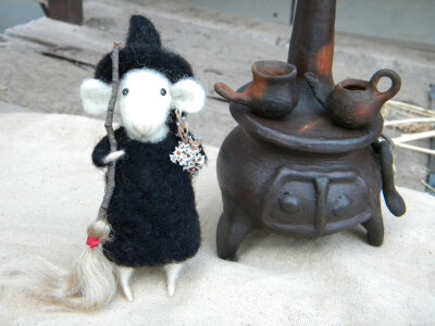 The Little Witch mouse and her Woodburning Stove for preparing Magic Potions