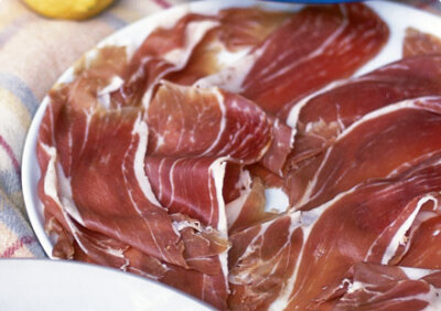 Pancetta is Italian cured pork belly - the equivalent of streaky bacon. It has a deep, strong, slightly salty flavour, is fairly fatty and comes either smoked or unsmoked.