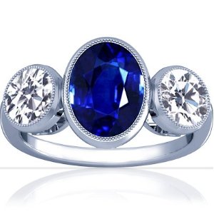 18K White Gold Oval Cut Blue Sapphire Three Stone Ring