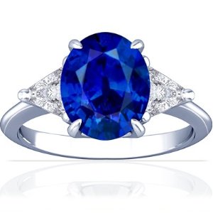 18K White Gold Oval Cut Blue Sapphire Three Stone Ring