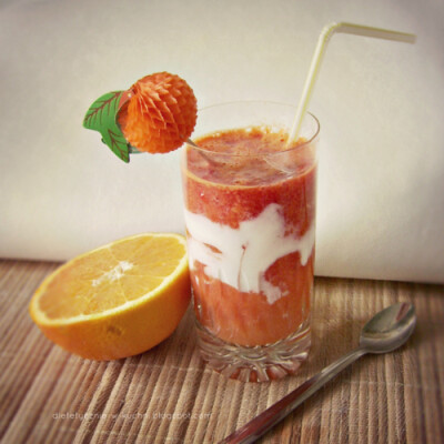 carrot juice with strawberry mousse and yogurt