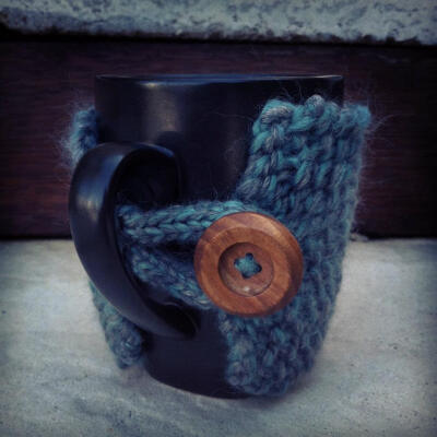 Sew Into You - Hand Knitted Mug Cozies. Finished off with a button fastener. Would make a great gift. $12 each plus postage.