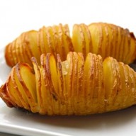 Sliced baked potatoes: thinly slice almost all the way through. drizzle with butter, olive oil, salt and pepper. bake at 425 for about 40 min