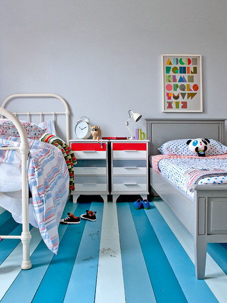 Floorboard in kid&#39;s bedroom Wall color isnt the only way to spice up a kids bedroom. The floor becomes the main attraction in this room with painted striped floorboards in varying shades of blue. And who says twin beds have to match? These beds have different but complementary ...