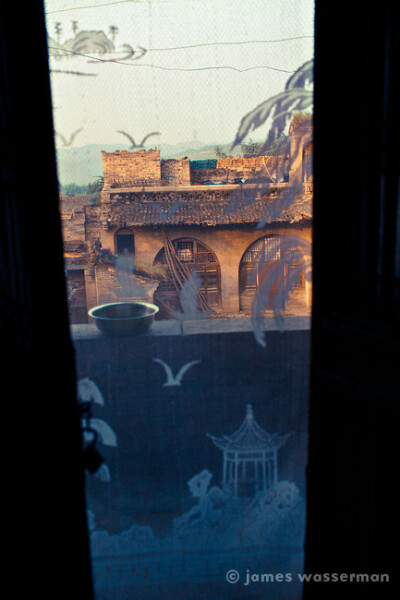 Looking out into a courtyard of cave houses in Li Jia Shan,