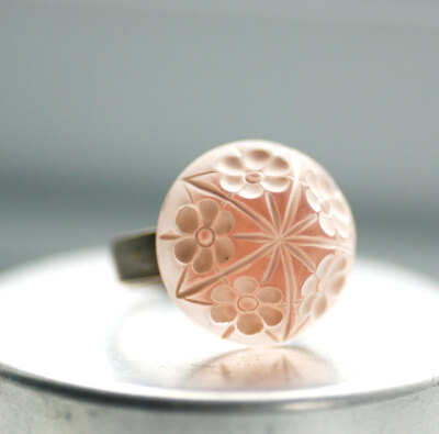 http://www.etsy.com/listing/74793271/blossom-ring-blush-peach-and-creamy