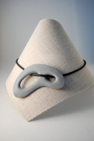 Bone Series Necklace in Grey - Tinted Porcelain and Black Neckband with Silver Clasp by Yasha Butler, Spain.