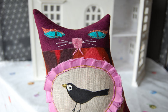 http://www.etsy.com/listing/92685599/textile-art-cat-doll-called-nina