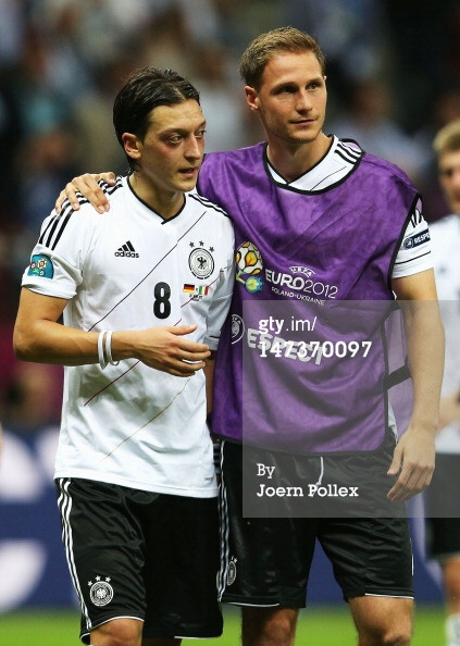 News Photo: Mesut Ozil and Benedikt Howedes of Germany show…