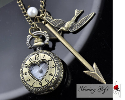 Hunger Games Real or not Real, Inspired Arrow,Bird, Mockingjay and Peeta Pearl Roman numerals Pocket watch Locket Necklace