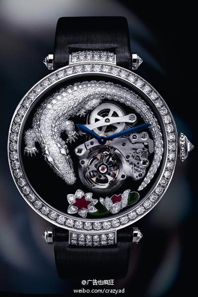 奢侈的艺术，Tourbillon and Crocodile Geneva Seal Watch陀飞轮鳄鱼纹饰腕表，面盘上立体造型满身钻石镶嵌的鳄鱼，旁边还伴随了一朵盛开着的睡莲。