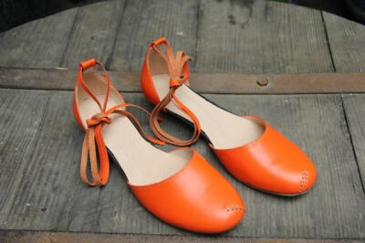 亮丽的橙色牛皮鞋