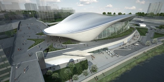 由zaha hadid建筑事务所为2012年伦敦奥运会设计的“伦敦水上运动中心”现已正式完工。这个可同时容纳17500人的运动场馆将举办游泳、跳水、花样游泳和水球等比赛项目。在游泳中心上部覆盖了一个跨度为160米，最宽处达90米的复合钢屋顶。三个实心混凝土柱子轻松的支撑起重达3000吨的屋顶结构。抛物线形的结构在视觉上让人联想到起伏波浪，与水上运动中心的功能相呼应。游泳池表面、更衣室和地面共铺设了850000块瓷砖。一系列混凝土比赛设施包括三米跳板和跳台都在现场浇注。