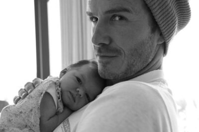 David Beckham and his newborn daughter Harper