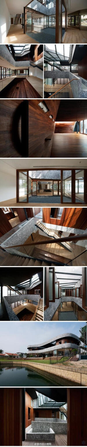 新加坡 linghao architects 设计的“S别墅”，曲线形的平面创造了一个没有“前”“后”方向的连续空间，木板墙私人卧室位于住宅二层，与一系列户外步道、游廊和庭院交错相连。首层楼板向建筑中心倾斜，创造了一个被…
