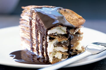 Mocha crepe torte with rich chocolate sauce