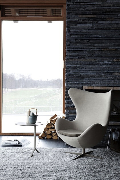 I would be very happy reading with a cup of tea in this modern chair