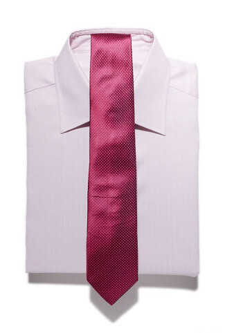 Tone on Tone Cotton shirt, $510, by Ermenegildo Zegna; silk spot tie, $149, Boss Black.