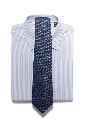 Cotton stripe shirt, $690, by Louis Vuitton; silk tie, $200, by Salvatore Ferragamo.