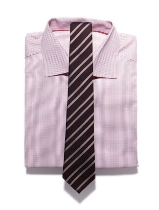 Check + Stripe Cotton small check shirt, $280, by Eton; silk stripe tie, $225, by Gucci.