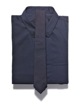 Tone on Tone Cotton shirt, $425, by Burberry Prorsum; silk tie, $220, by Dolce &amp; Gabbana.