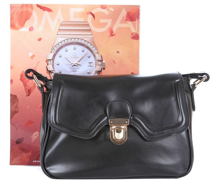 小蝴蝶复古真皮包包