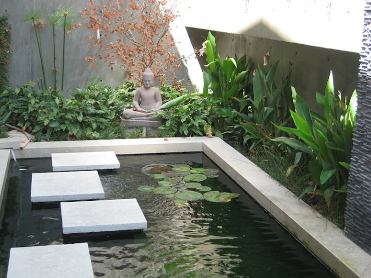 gardens - zen koi pond stone buddha Zen koi pond with Buddha.