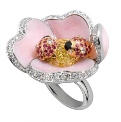 "Ladybird" ring, white gold, pink gold, pink opals, yellow sapphires, rubies, black lacquer, and diamonds by Cartier.