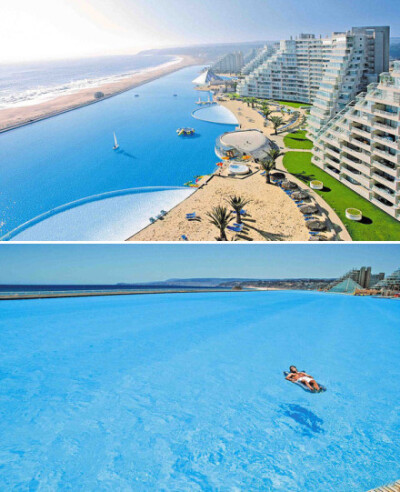世界最大游泳池——智利圣阿方索德米度假村游泳池，长1公里，面积8万平方米，可以在里面泛舟啦！当然，这座游泳池不但是吉尼斯世界纪录承认的世界上最大的游泳池，同时也是世界最深游泳池，最深处达35米。＝＝其实我…