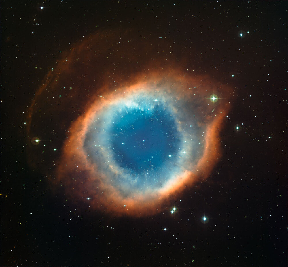 Infrared/visible light comparison view of the Helix Nebula