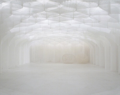 This wonderfully placid installation, Aurora, which is made out of a wavy, diaphanous fabric, was created by Ryuji Nakamura. Both light and wind is allowed to flow through this piece which gives it its soft and soothing feel.