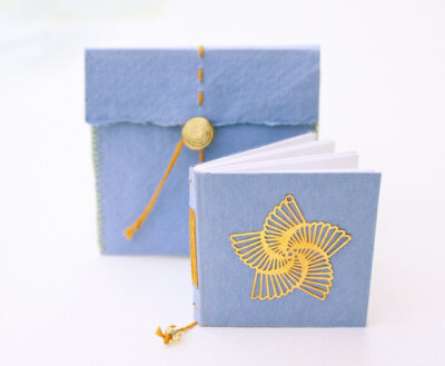 Star of Hope, small book, longstitch binding,book arts, prayer, handwritten, orange, blue. europeanstreetteam