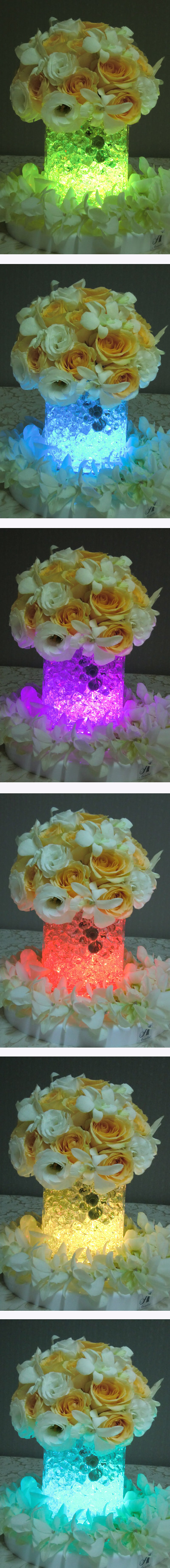 LED霓彩桌灯变幻8种美丽色彩，少少的花，营造大大的婚礼光彩。