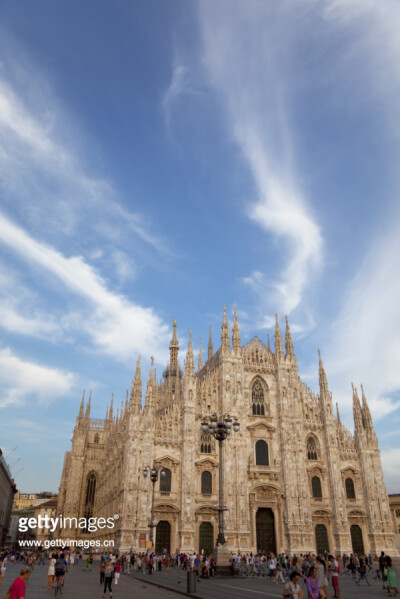 the facade of Milan cathedral with cloud